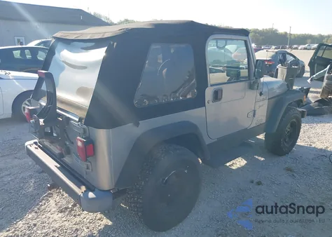 2002 Jeep Wrangler Sport z USA, uszkodzony, nr VIN 1J4FA49S62P704565